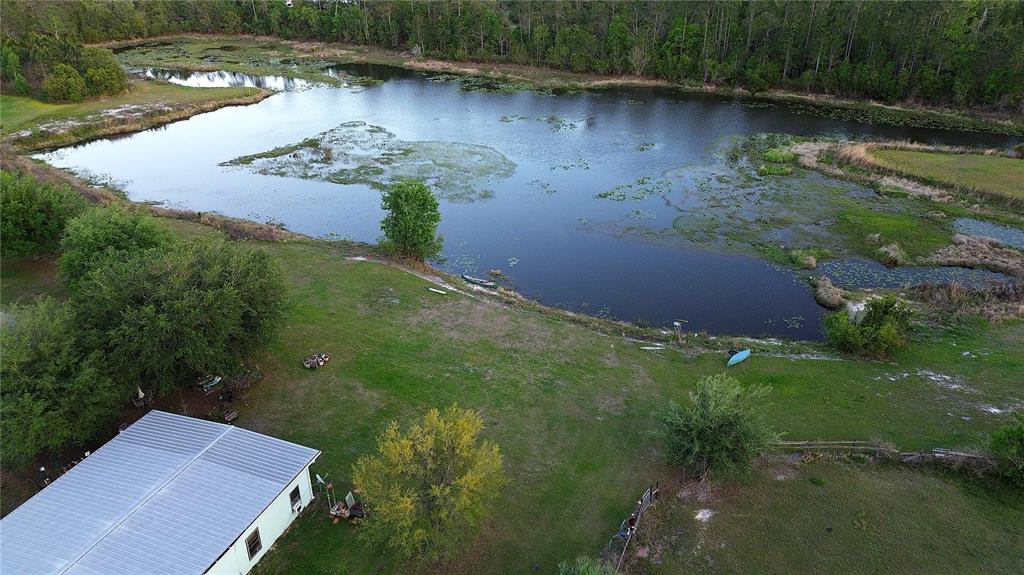 54523 Astor Transfer Station Road Astor, FL 32102 - Photo 24 of 31 an aerial view of a house with a yard