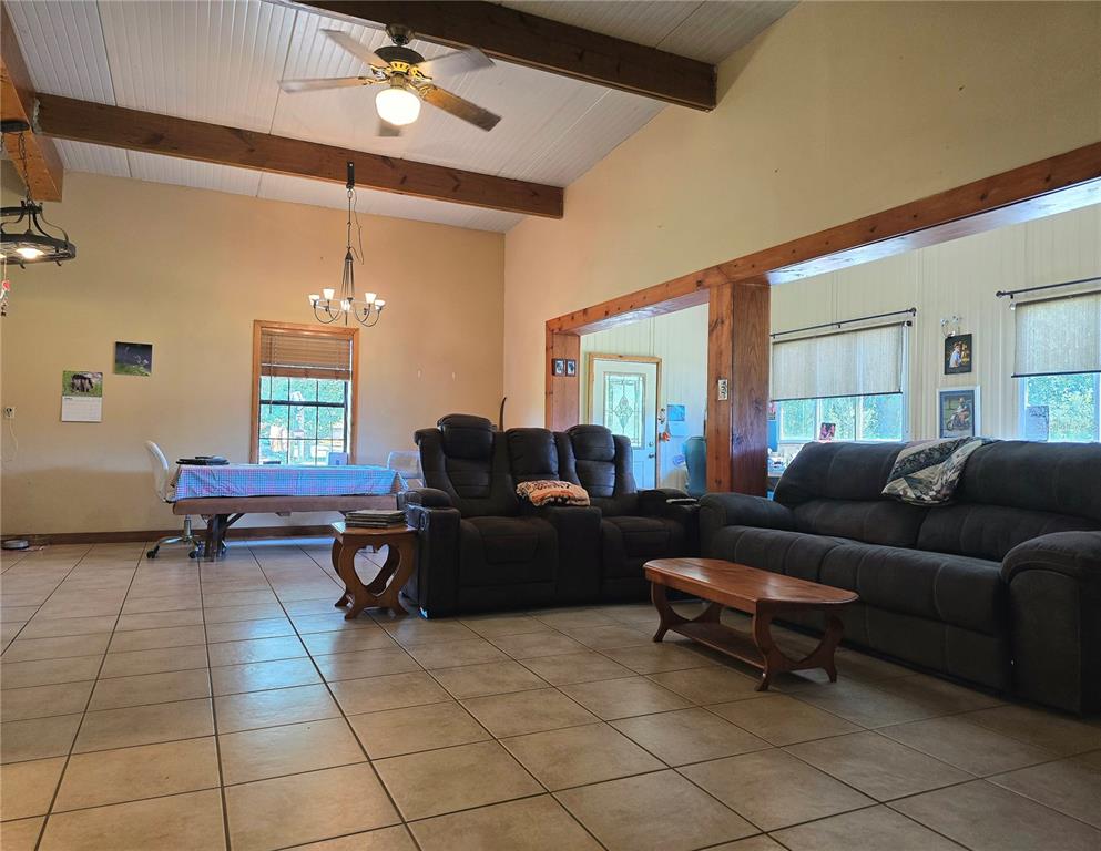 54523 Astor Transfer Station Road Astor, FL 32102 - Photo 7 of 31 a living room with furniture and a window