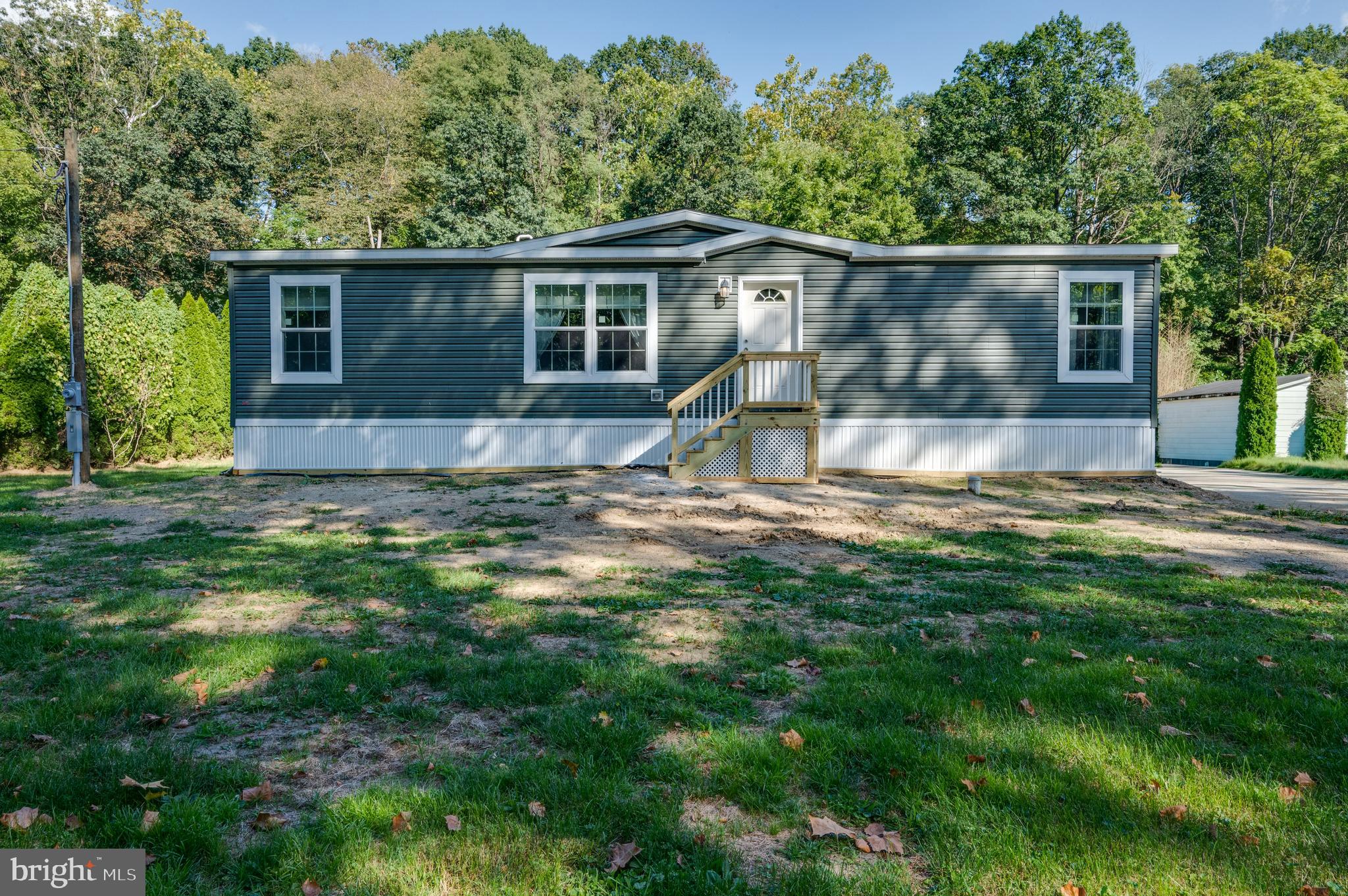 875 Mohrsville Road Shoemakersville, PA 19555 - Photo 1 of 34 a view of a house with a yard