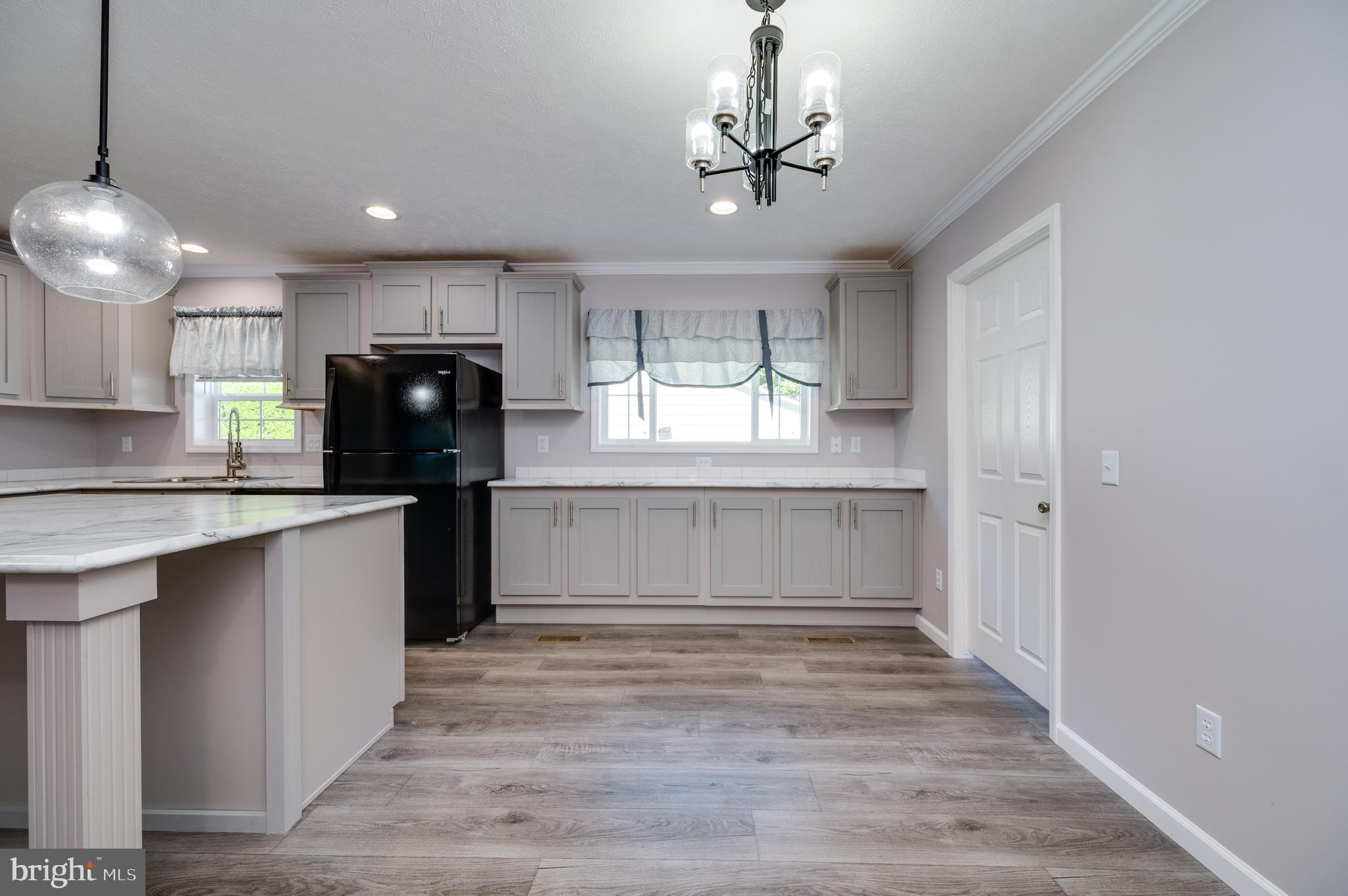 875 Mohrsville Road Shoemakersville, PA 19555 - Photo 19 of 34 a kitchen with kitchen island a counter space a sink and appliances