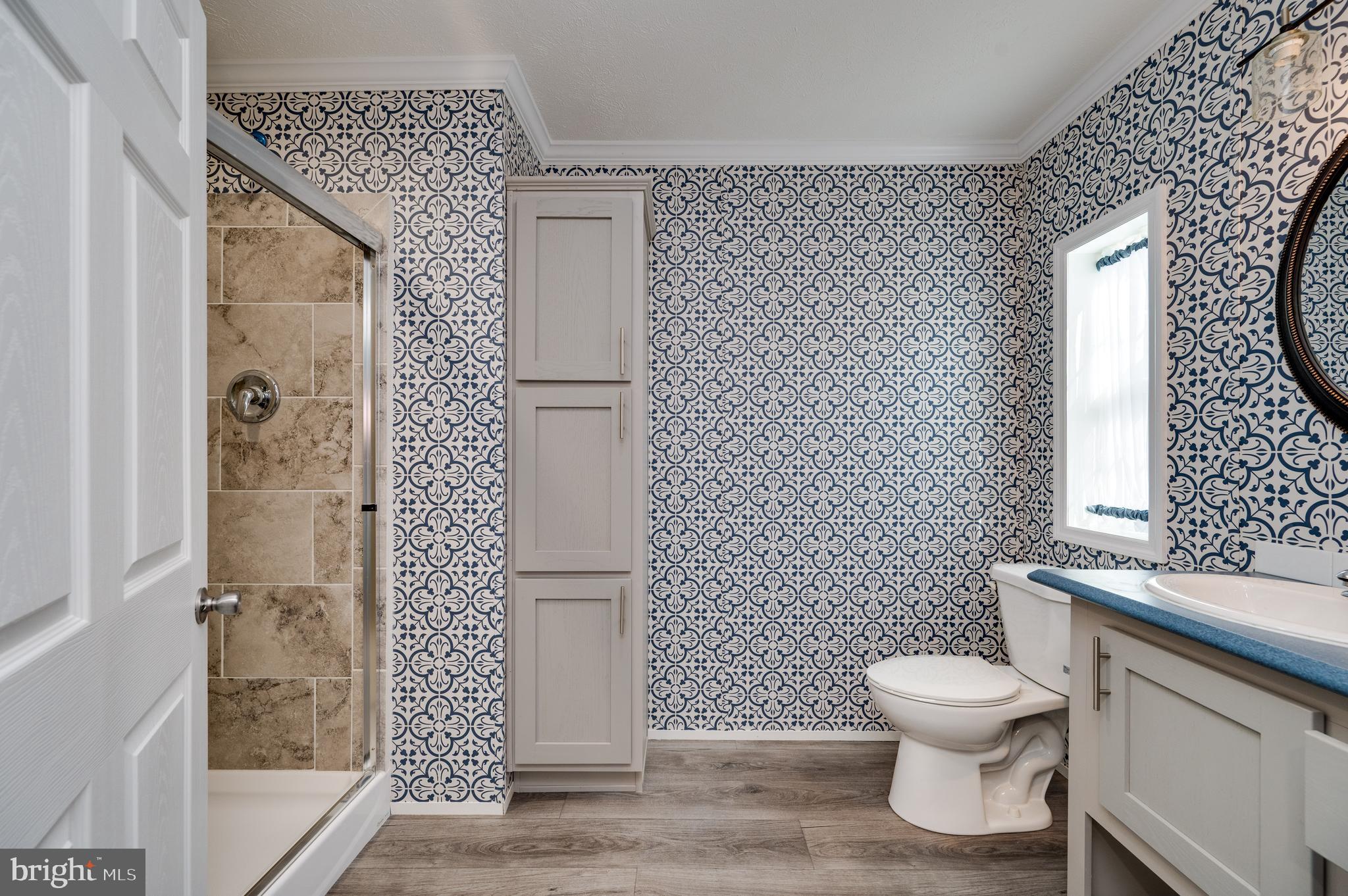 875 Mohrsville Road Shoemakersville, PA 19555 - Photo 24 of 34 a white toilet sitting next to a bathroom sink