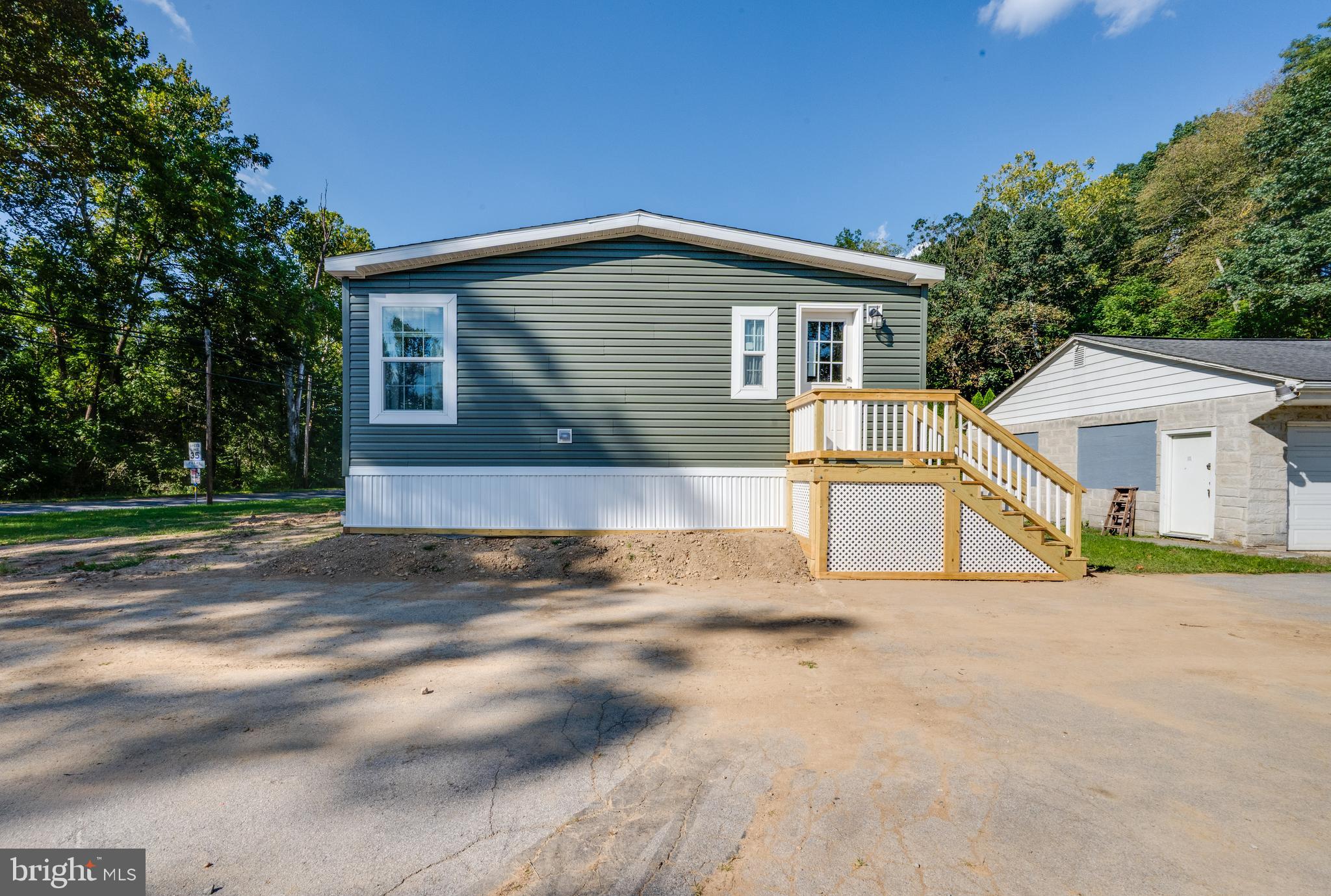 875 Mohrsville Road Shoemakersville, PA 19555 - Photo 3 of 34 a view of a house with a outdoor space