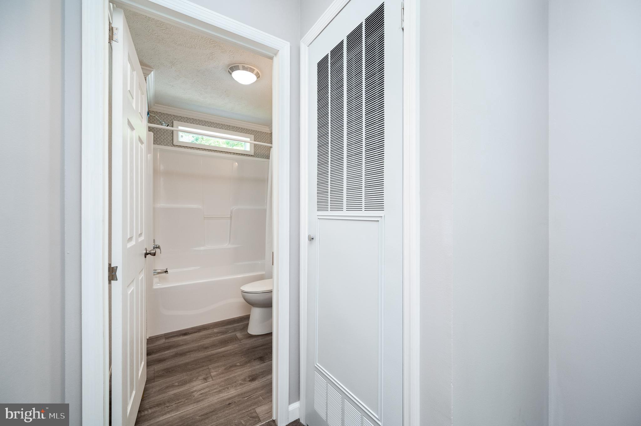 875 Mohrsville Road Shoemakersville, PA 19555 - Photo 31 of 34 a bathroom with a bathtub and a shower