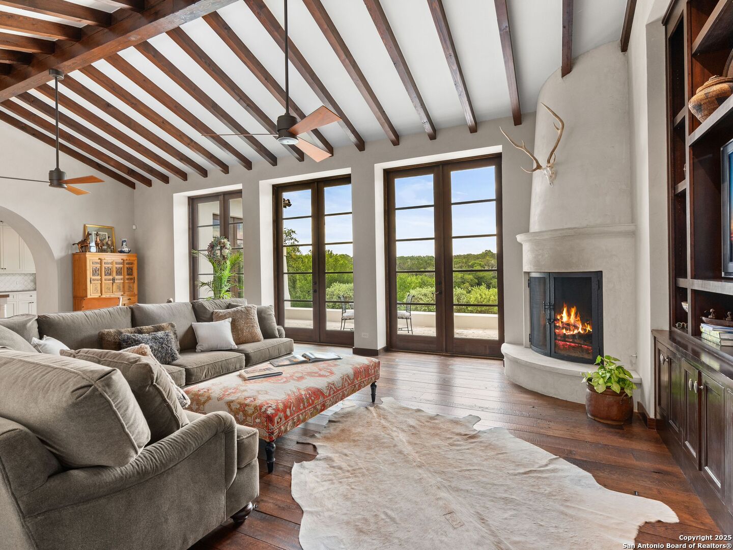 2835 Palomino Springs Bandera, TX 78003 - Photo 17 of 77 a living room with furniture and a fireplace