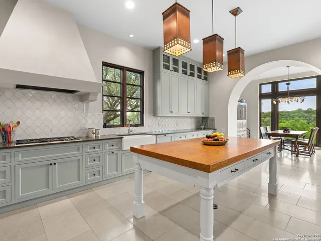 a spacious bathroom with a bathtub and a shower