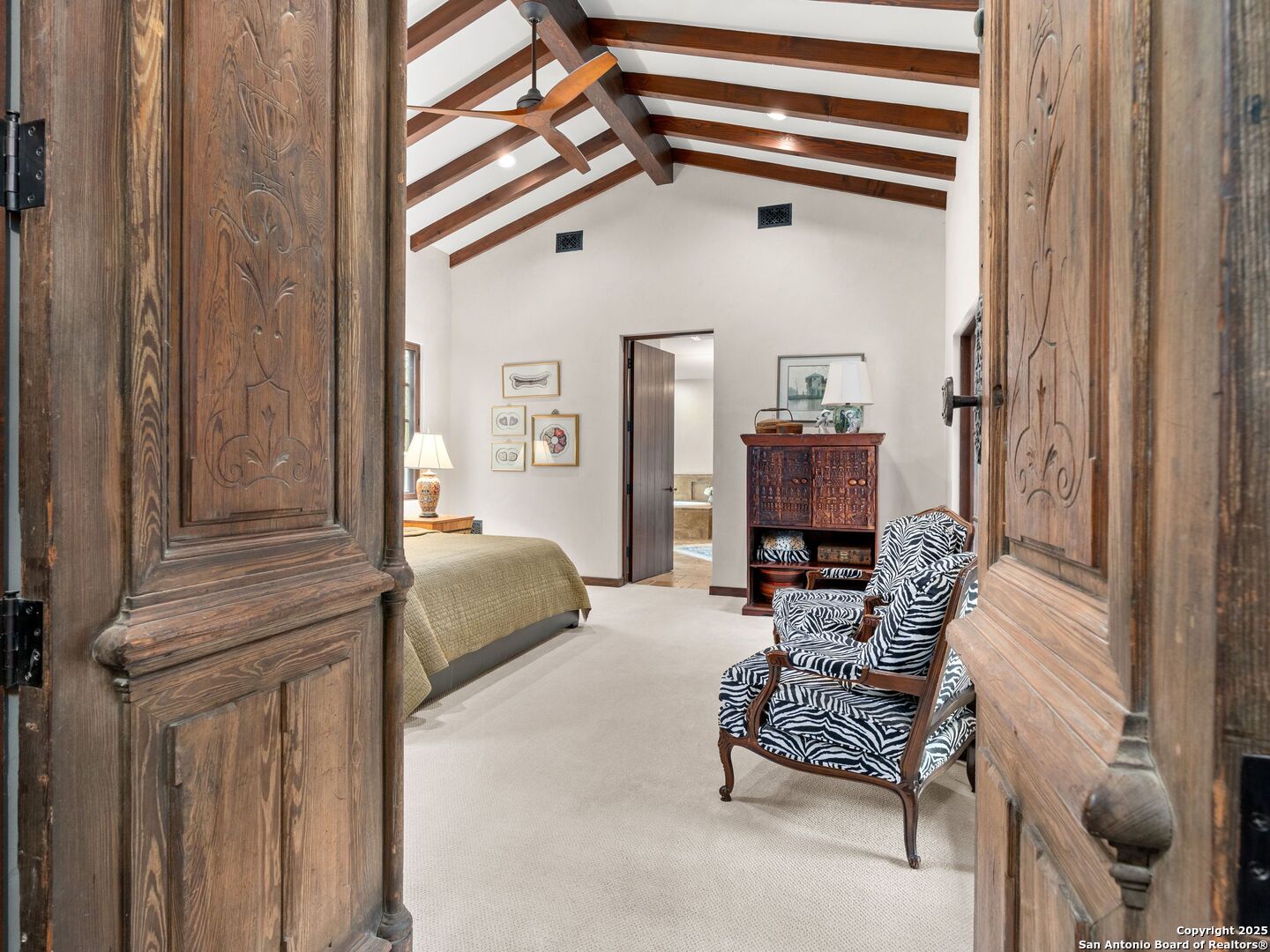 2835 Palomino Springs Bandera, TX 78003 - Photo 30 of 77 a bedroom with furniture and a window