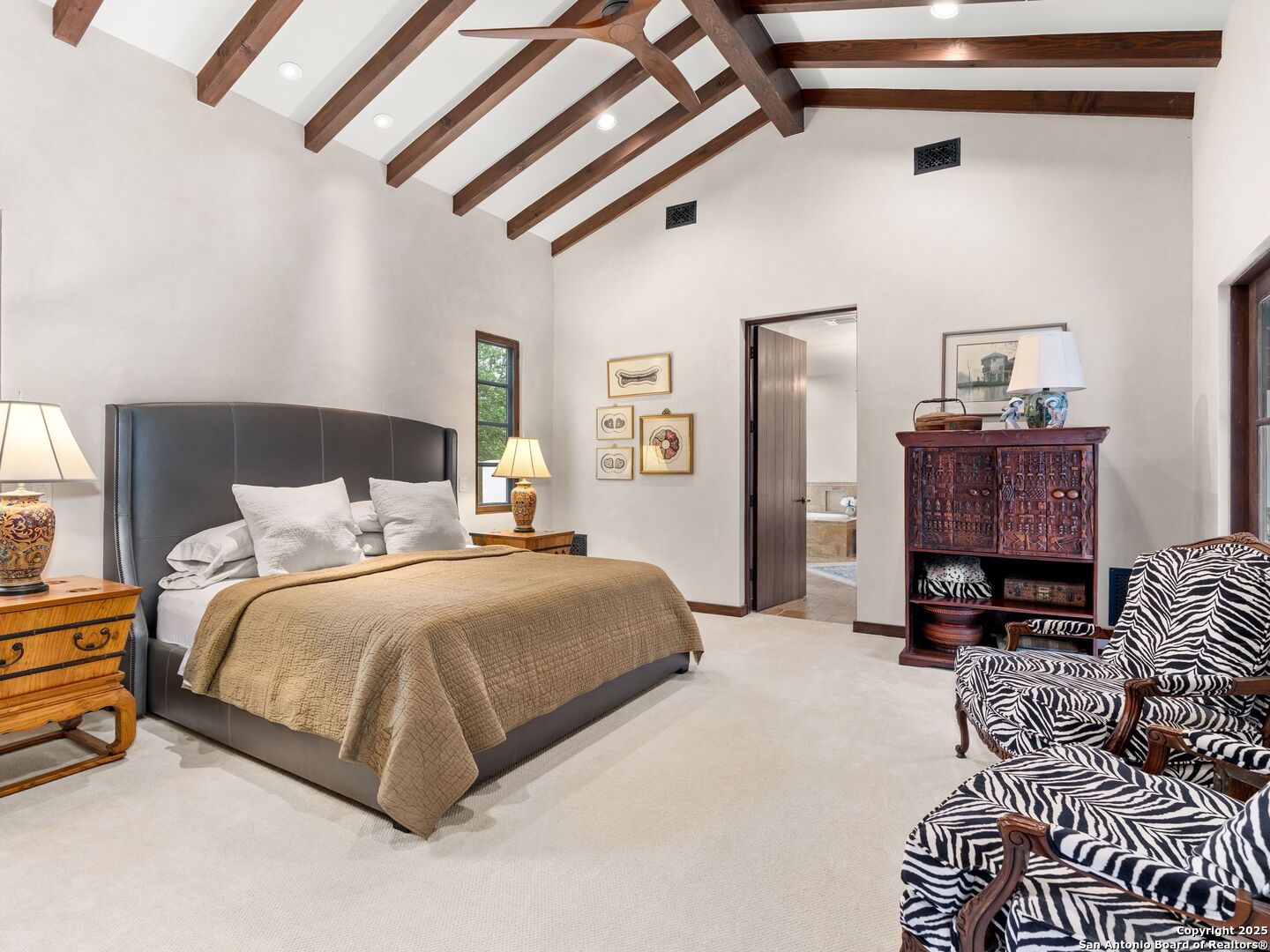 2835 Palomino Springs Bandera, TX 78003 - Photo 31 of 77 a bedroom with a bed and a couch