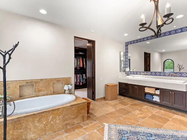 a outdoor space with patio couch and a fire pit