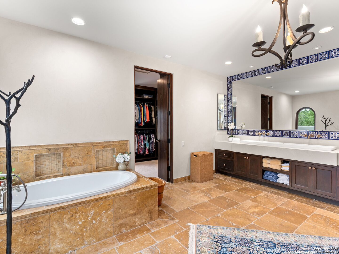 2835 Palomino Springs Bandera, TX 78003 - Photo 33 of 77 a spacious bathroom with a tub and sink