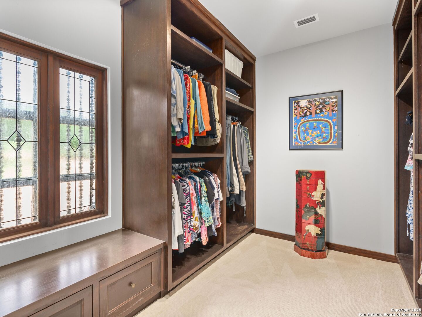 2835 Palomino Springs Bandera, TX 78003 - Photo 35 of 77 a view of walk in closet with clothes and shoes