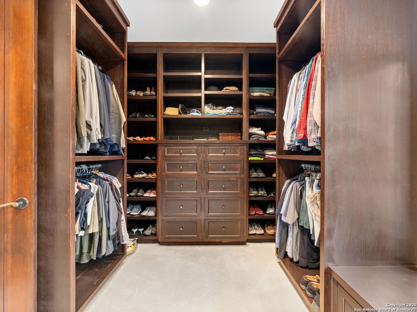 2835 Palomino Springs Bandera, TX 78003 - Photo 36 of 77 a view of walk in closet with clothes and shoes