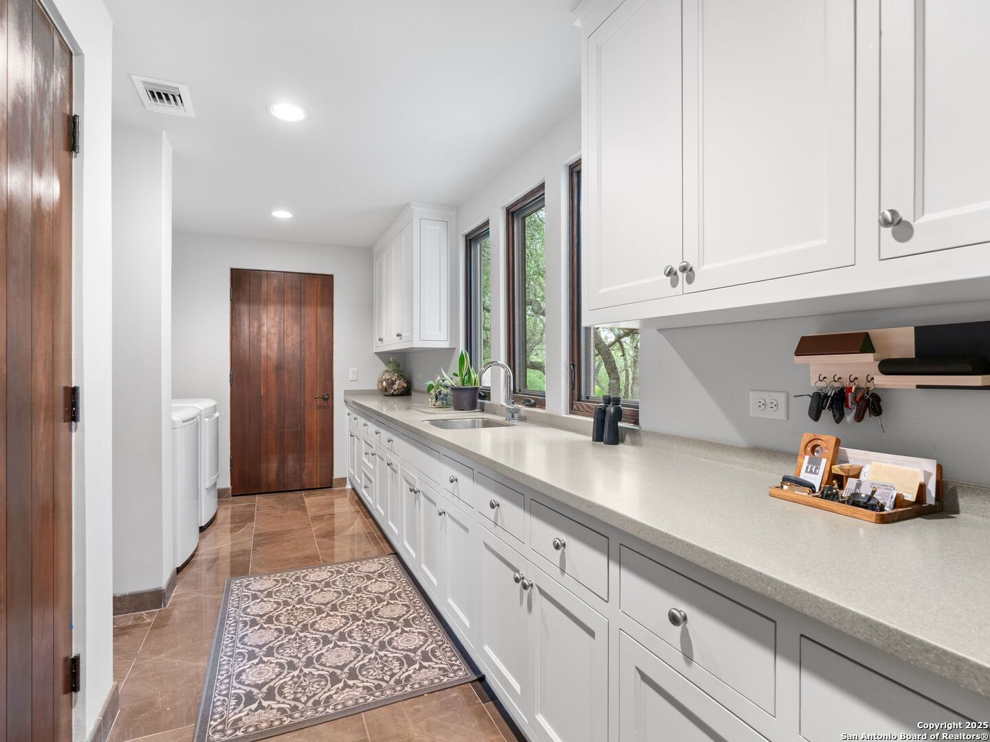2835 Palomino Springs Bandera, TX 78003 - Photo 37 of 77 a kitchen with sink and cabinets