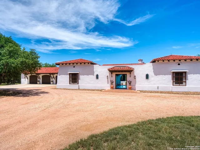 a front view of a house with a garage