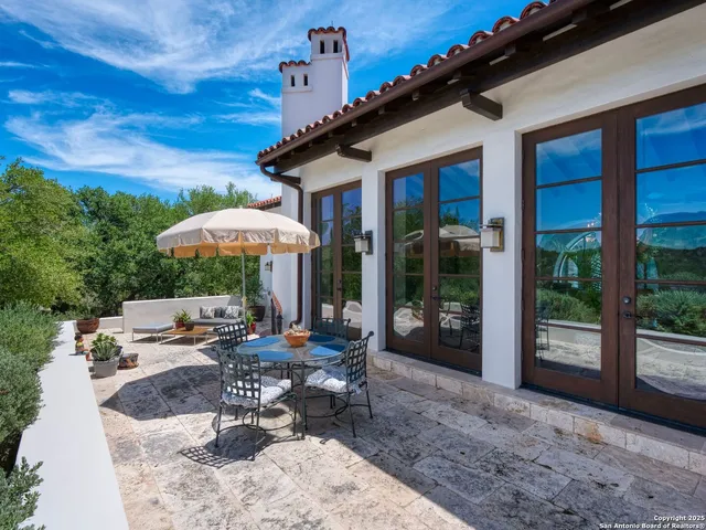 a view of a field with a tree