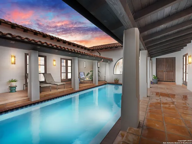 a view of a yard and a house in the background