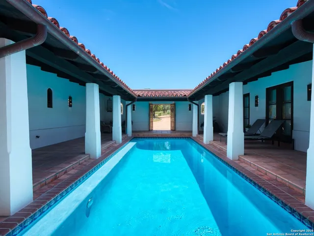 a living room with a couch and a table
