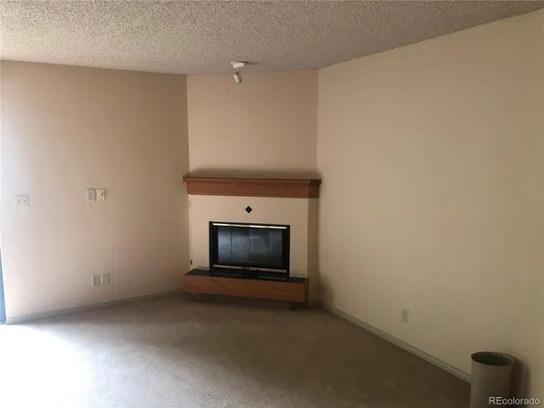 a room with a fireplace