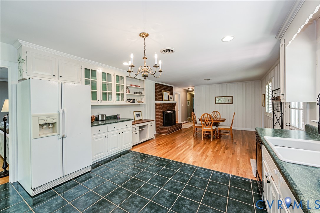 15611 Robert Terrell Road Montpelier, VA 23192 - Photo 4 of 28 Kitchen featuring dark square tile flooring, white