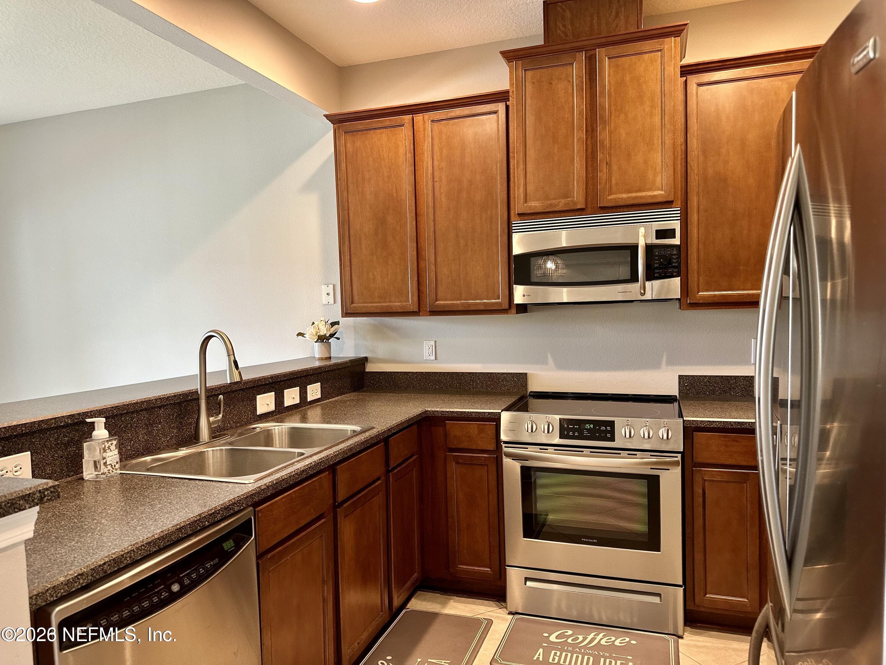 12946 Spring Rain Road Jacksonville, FL 32258 - Photo 8 of 25 KITCHEN