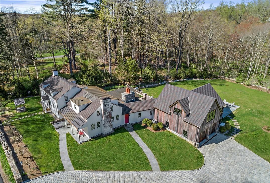 127 Barnegat Road Pound Ridge, NY 10576 - Photo 1 of 1 an aerial view of a house with a garden and trees