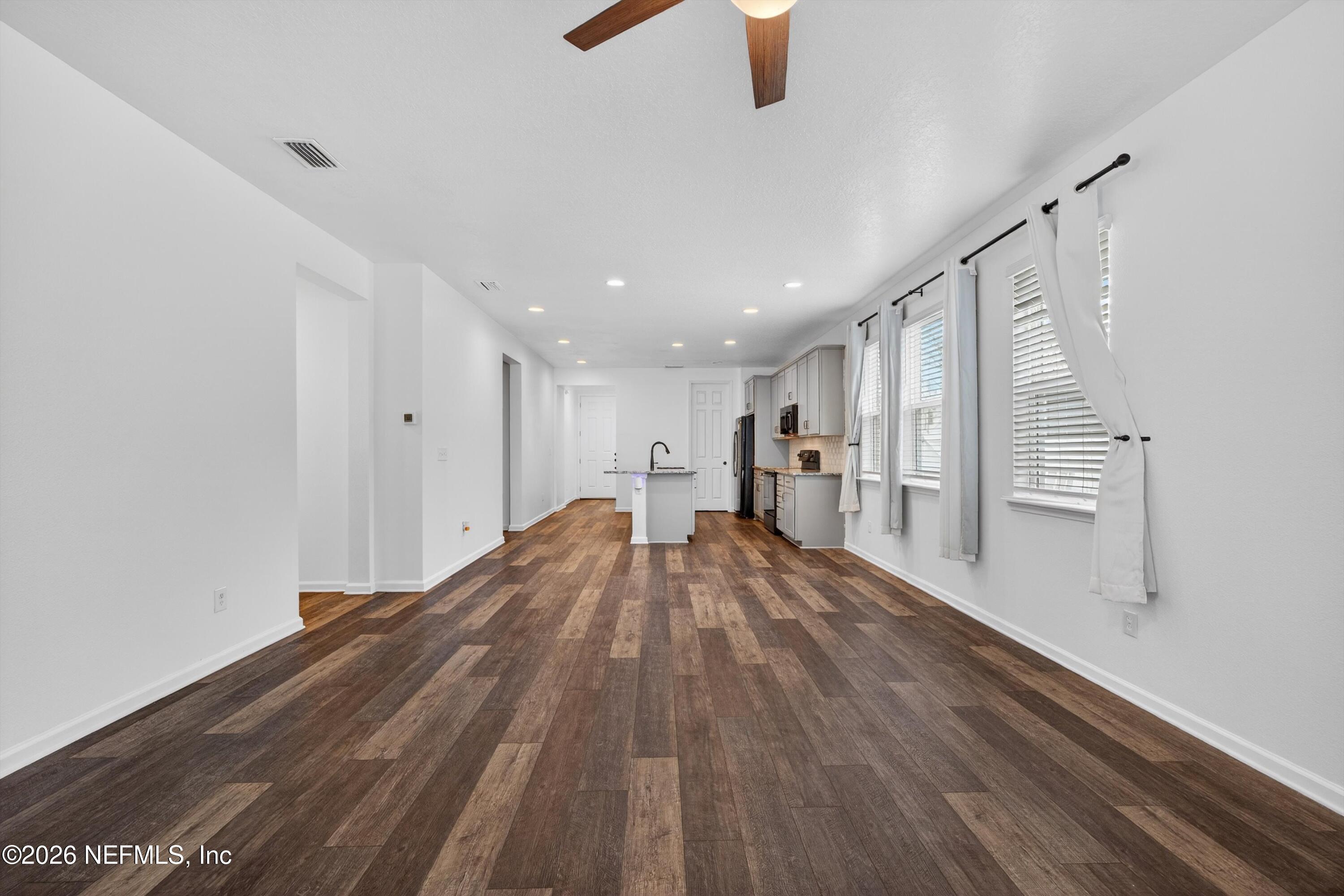 1062 Persimmon Drive Middleburg, FL 32068 - Photo 12 of 45 Living Room & Kitchen