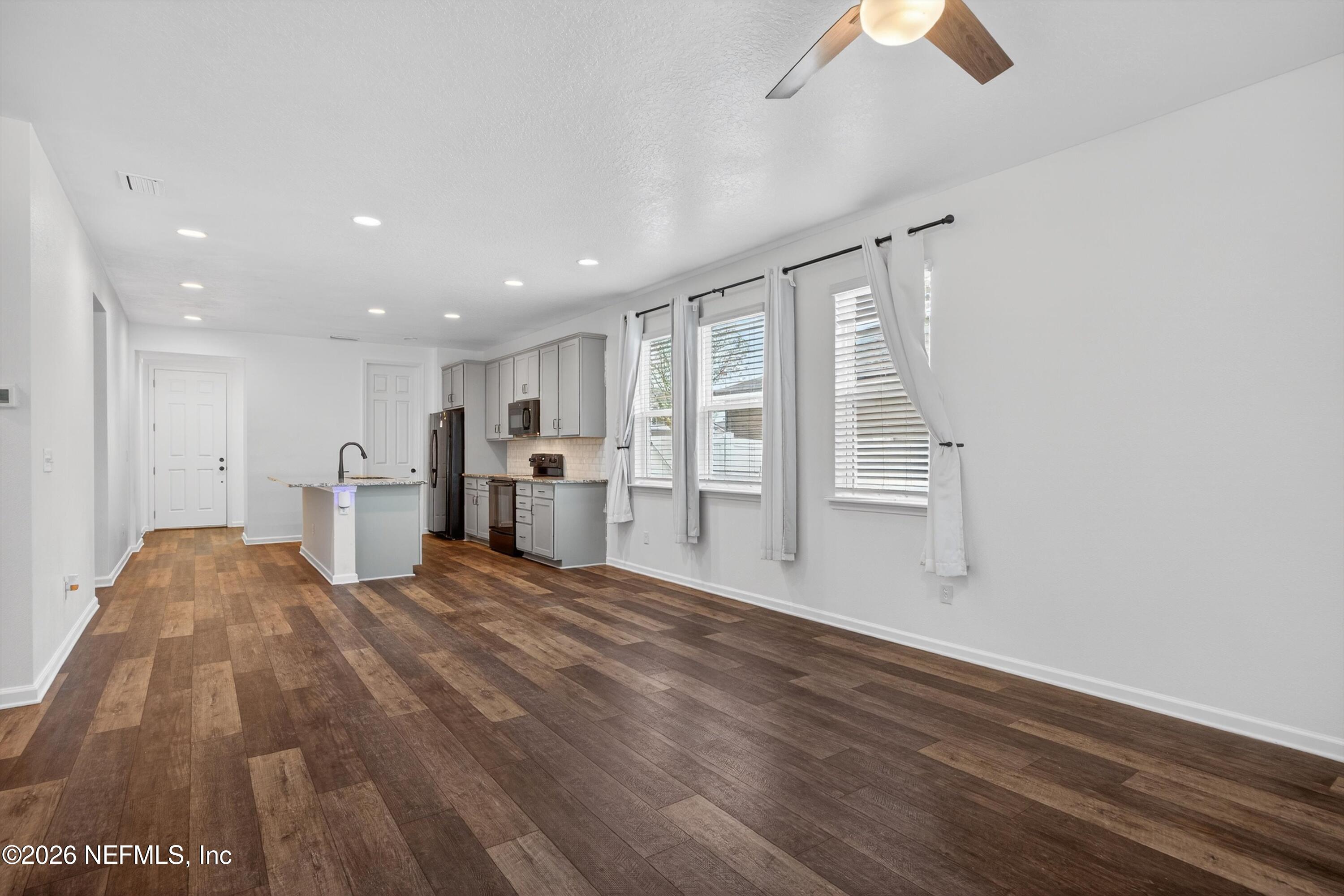 1062 Persimmon Drive Middleburg, FL 32068 - Photo 13 of 45 Living Room/ Kitchen