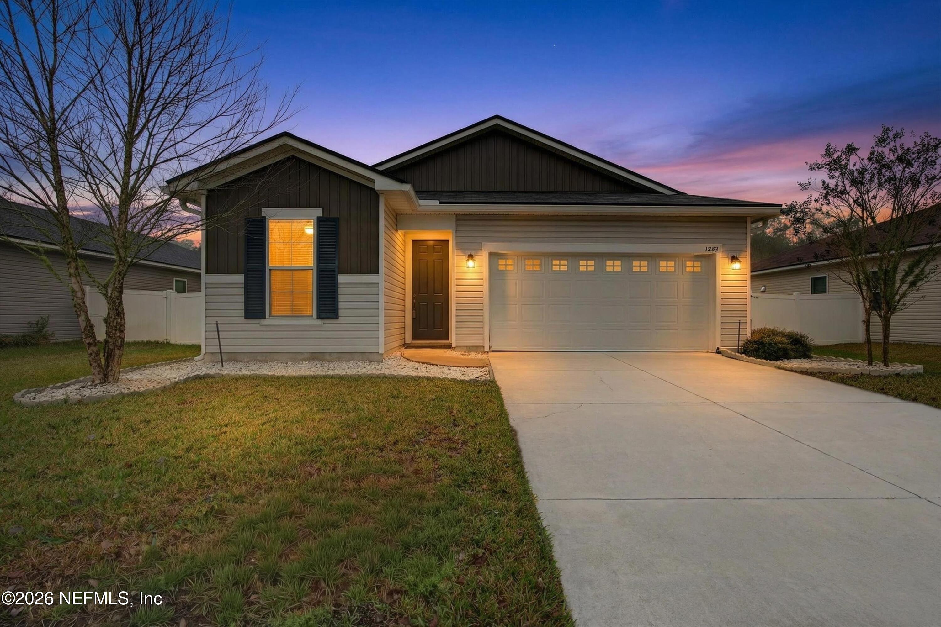 1062 Persimmon Drive Middleburg, FL 32068 - Photo 2 of 45 1-Front Twilight