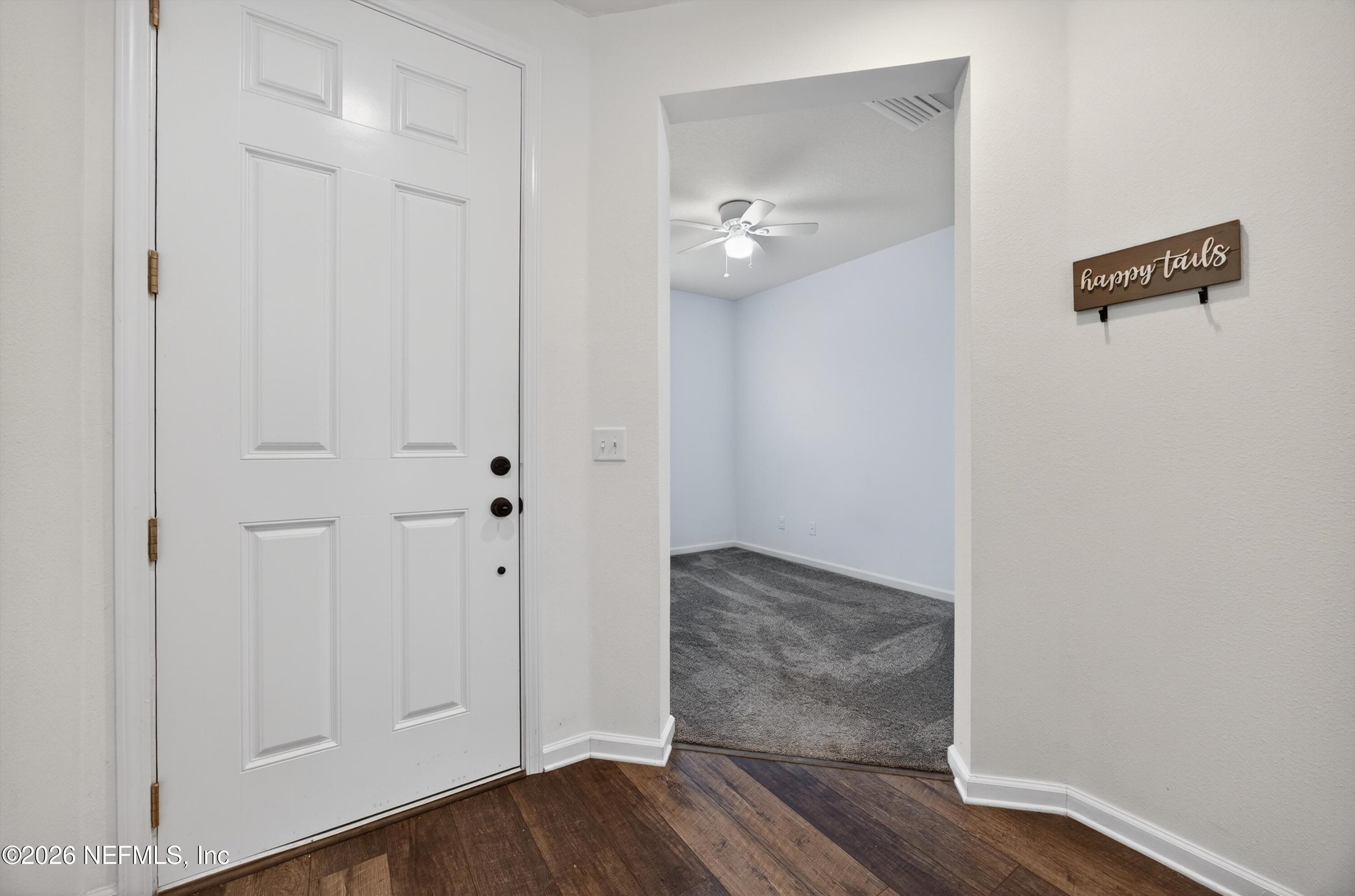 1062 Persimmon Drive Middleburg, FL 32068 - Photo 21 of 45 wooden floor in an empty room
