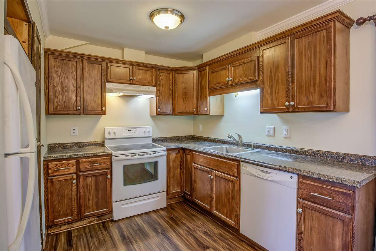5608 Falls Of Neuse Road, Unit E Raleigh, NC 27609 - Photo 8 of 28 Kitchen has lots of storage and counter space Kitchen