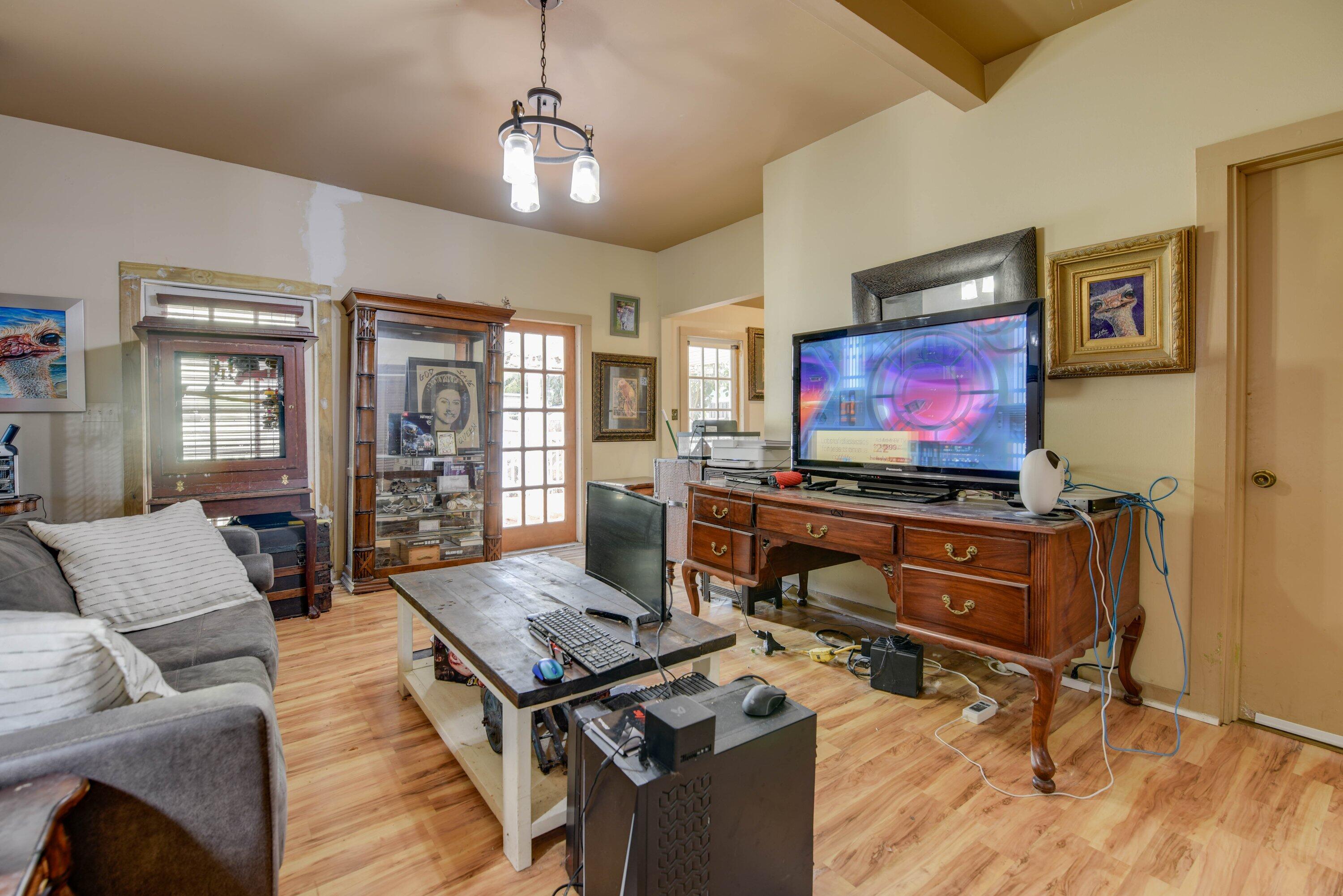 1306 Virginia Street Key West, FL 33040 - Photo 19 of 30 a living room with furniture and a flat screen tv