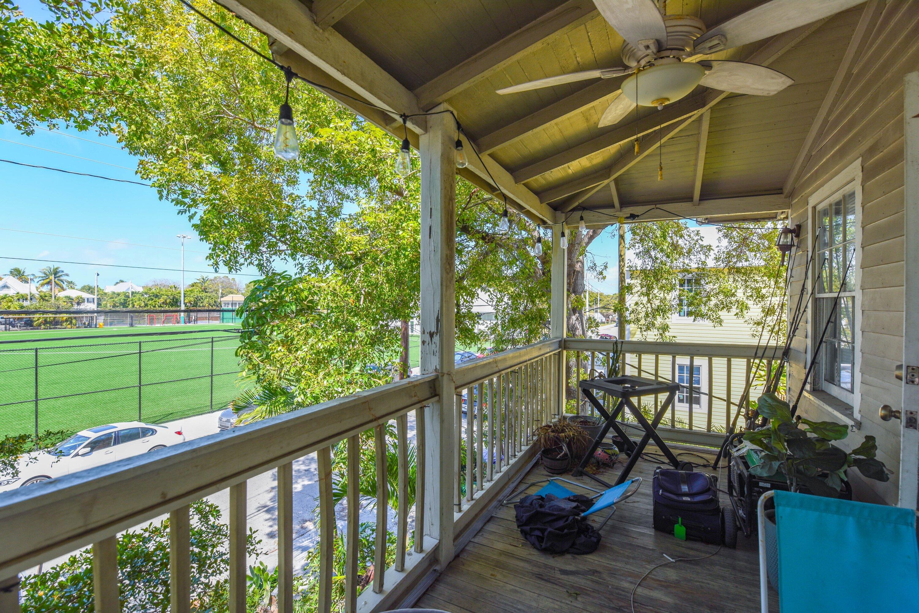 1306 Virginia Street Key West, FL 33040 - Photo 30 of 30 a view of balcony with furniture
