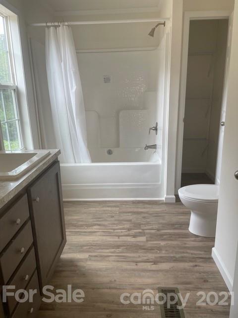 1471 Howard Gap Loop Road Flat Rock, NC 28731 - Photo 17 of 24 a bathroom with a toilet and a shower