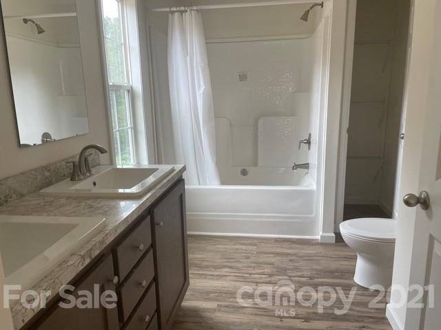 1471 Howard Gap Loop Road Flat Rock, NC 28731 - Photo 18 of 24 a bathroom with a sink and a mirror