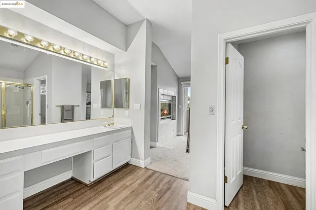 a bathroom with a bathtub and a sink