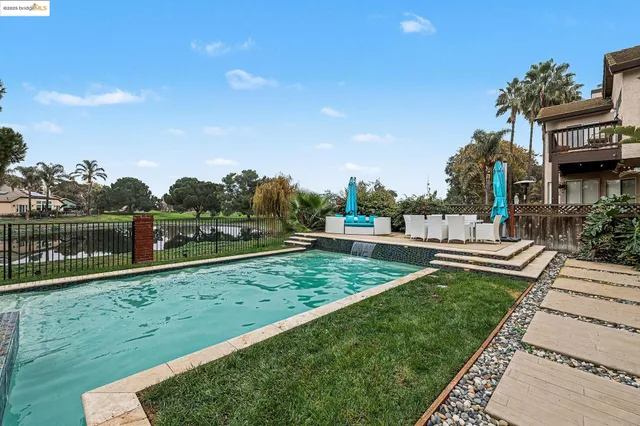 a view of a garden with an outdoor space