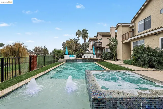 a view of a street with a building in the background