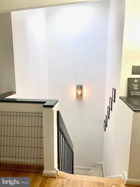 3871 Porter Street Northwest, Unit E293 Washington, DC 20016 - Photo 14 of 57 Staircase to downstairs