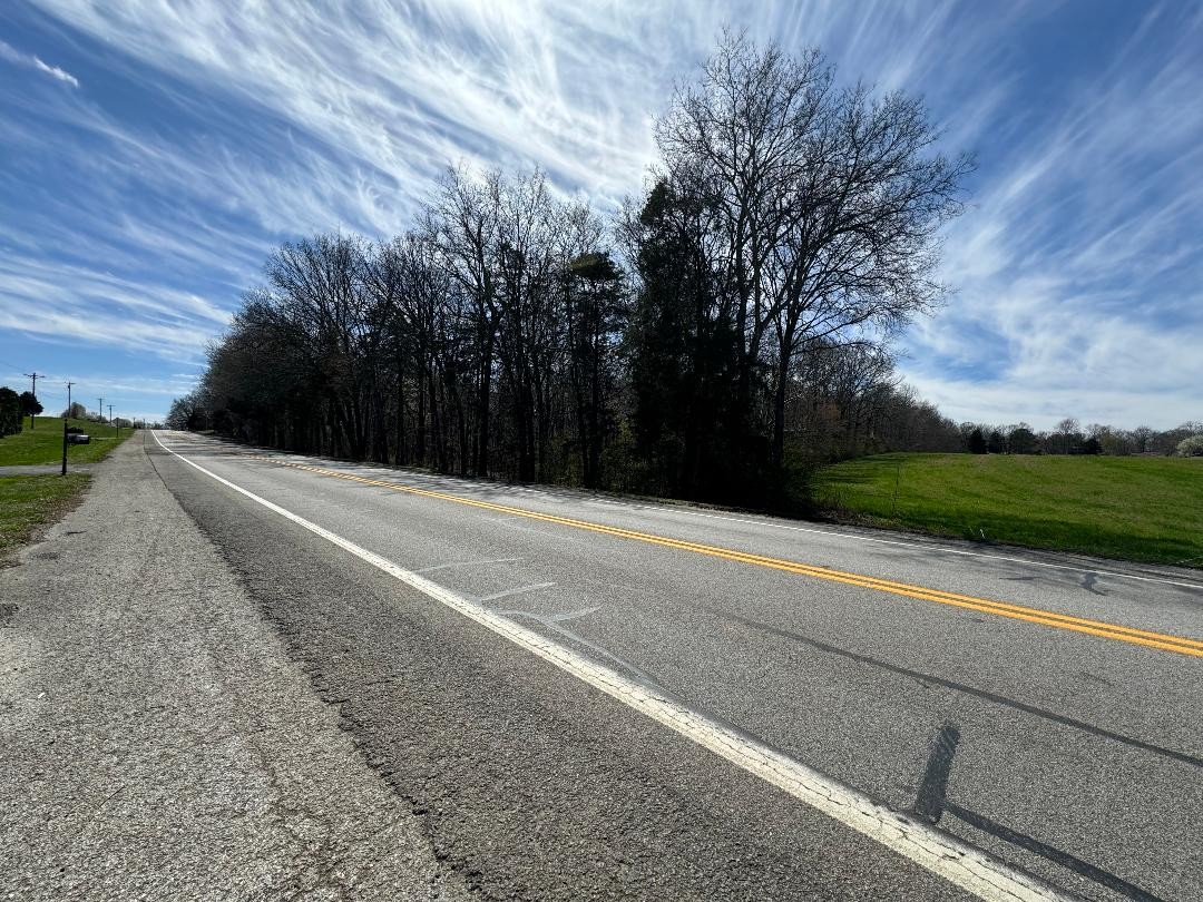 0 Main Street Huntland, TN 37345 - Photo 4 of 5 a backyard of a house with lots of green space