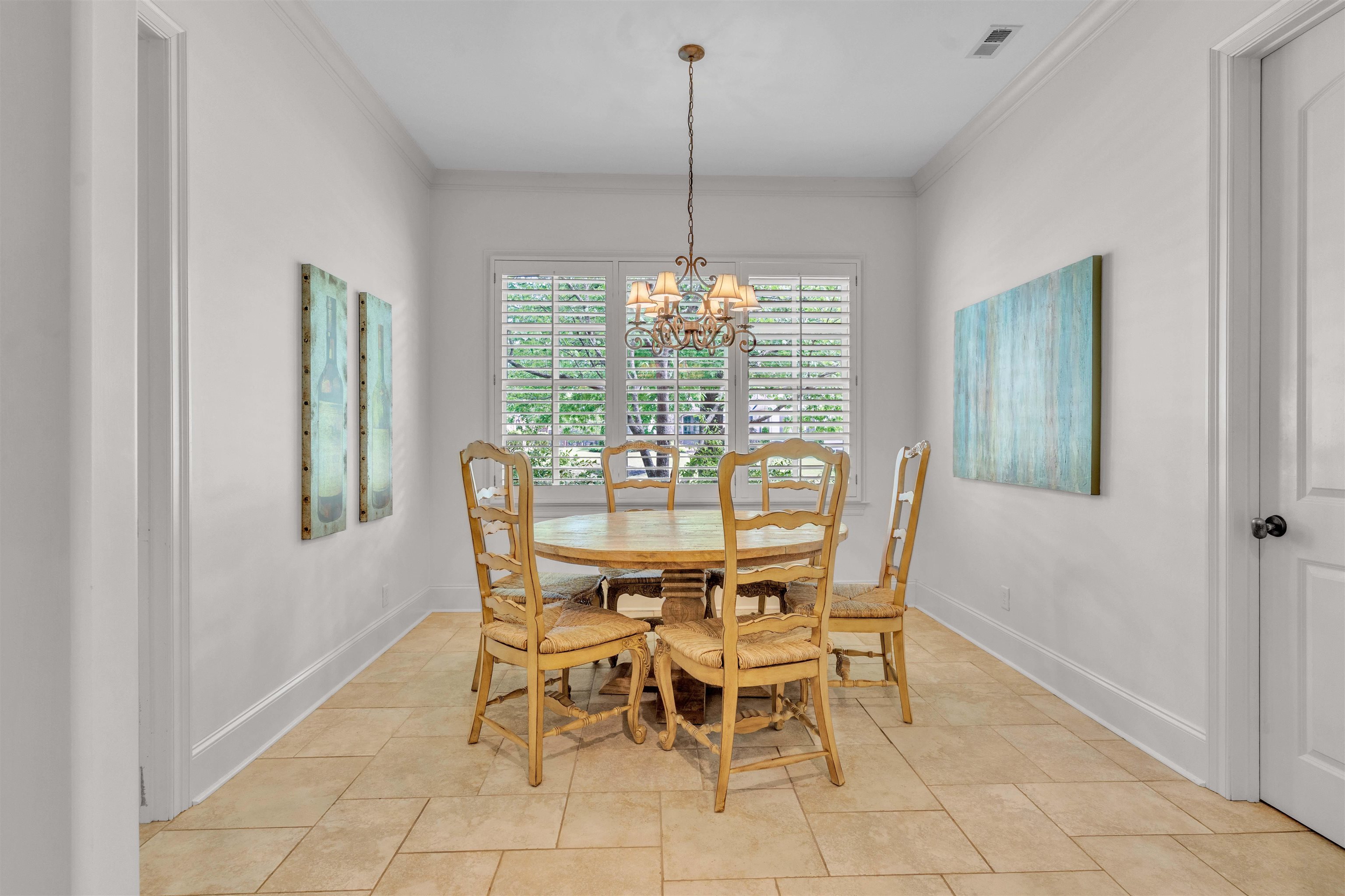 1218 Braystone Trail Collierville, TN 38017 - Photo 17 of 40 Dining room with ornamental molding and hanging lights
