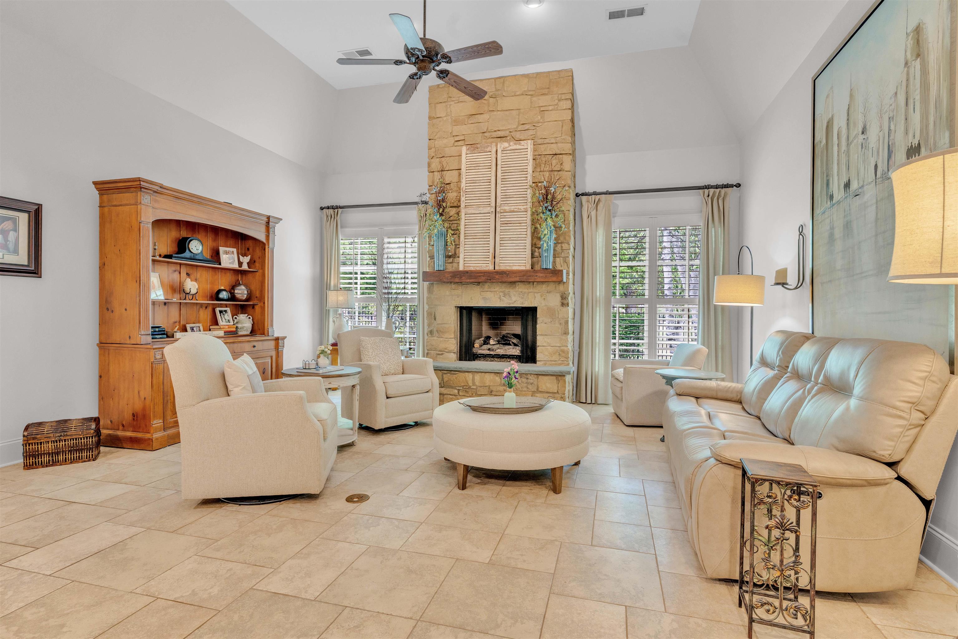 1218 Braystone Trail Collierville, TN 38017 - Photo 18 of 40 Living room with a ceiling fan, a fireplace, and vaulted ceiling