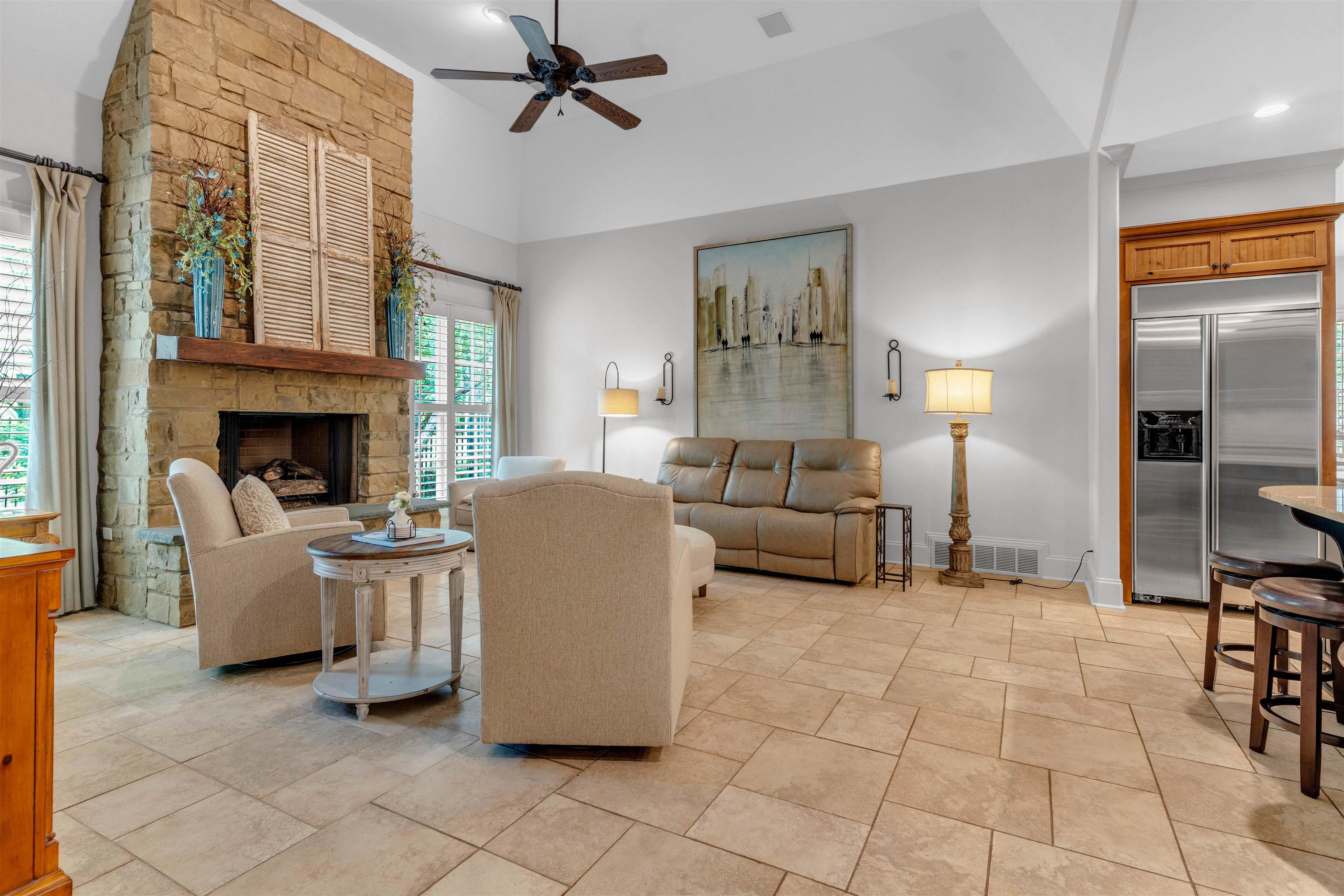 1218 Braystone Trail Collierville, TN 38017 - Photo 19 of 40 a living room with furniture a fireplace and a chandelier