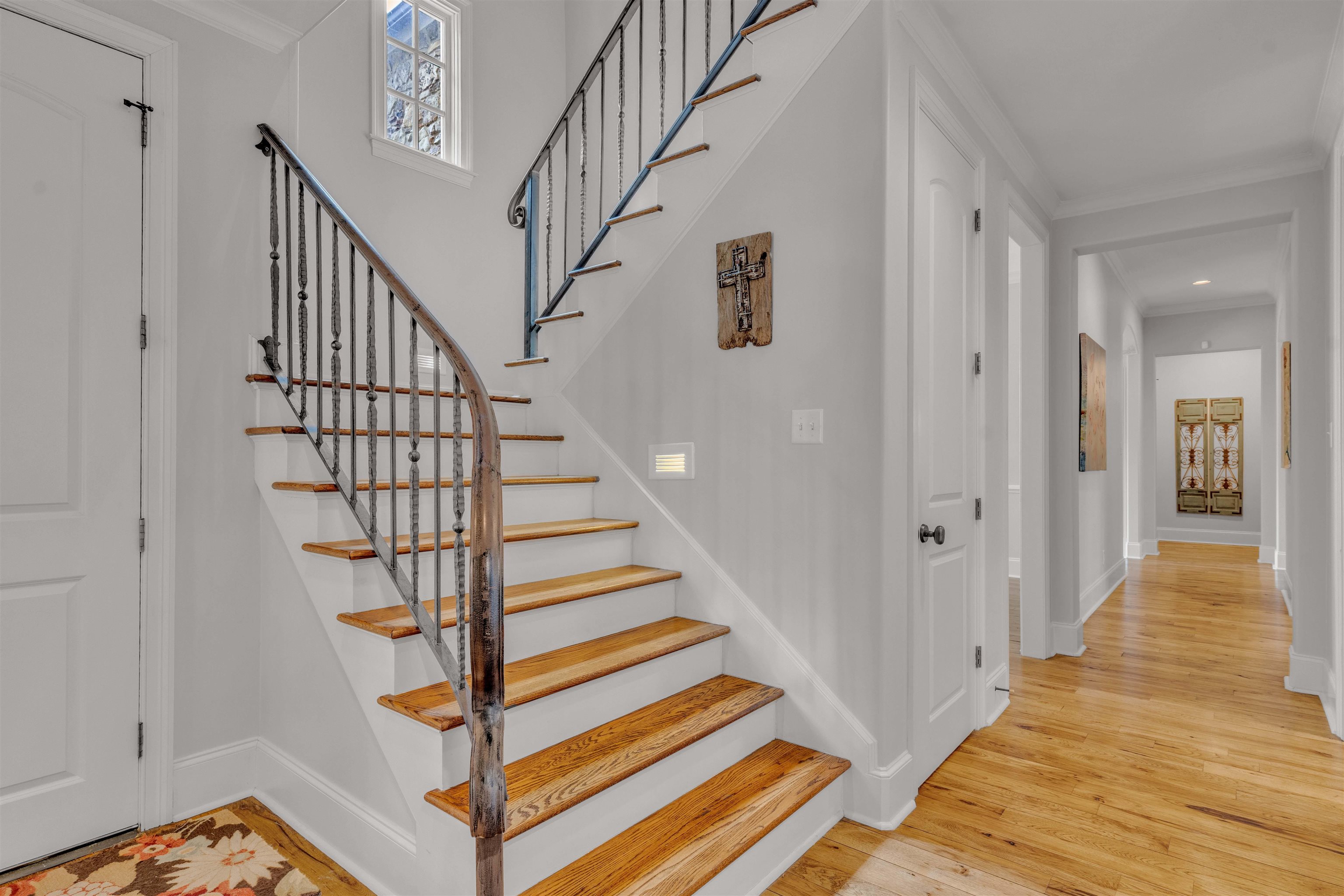 1218 Braystone Trail Collierville, TN 38017 - Photo 24 of 40 a view of entryway and hall with wooden floor