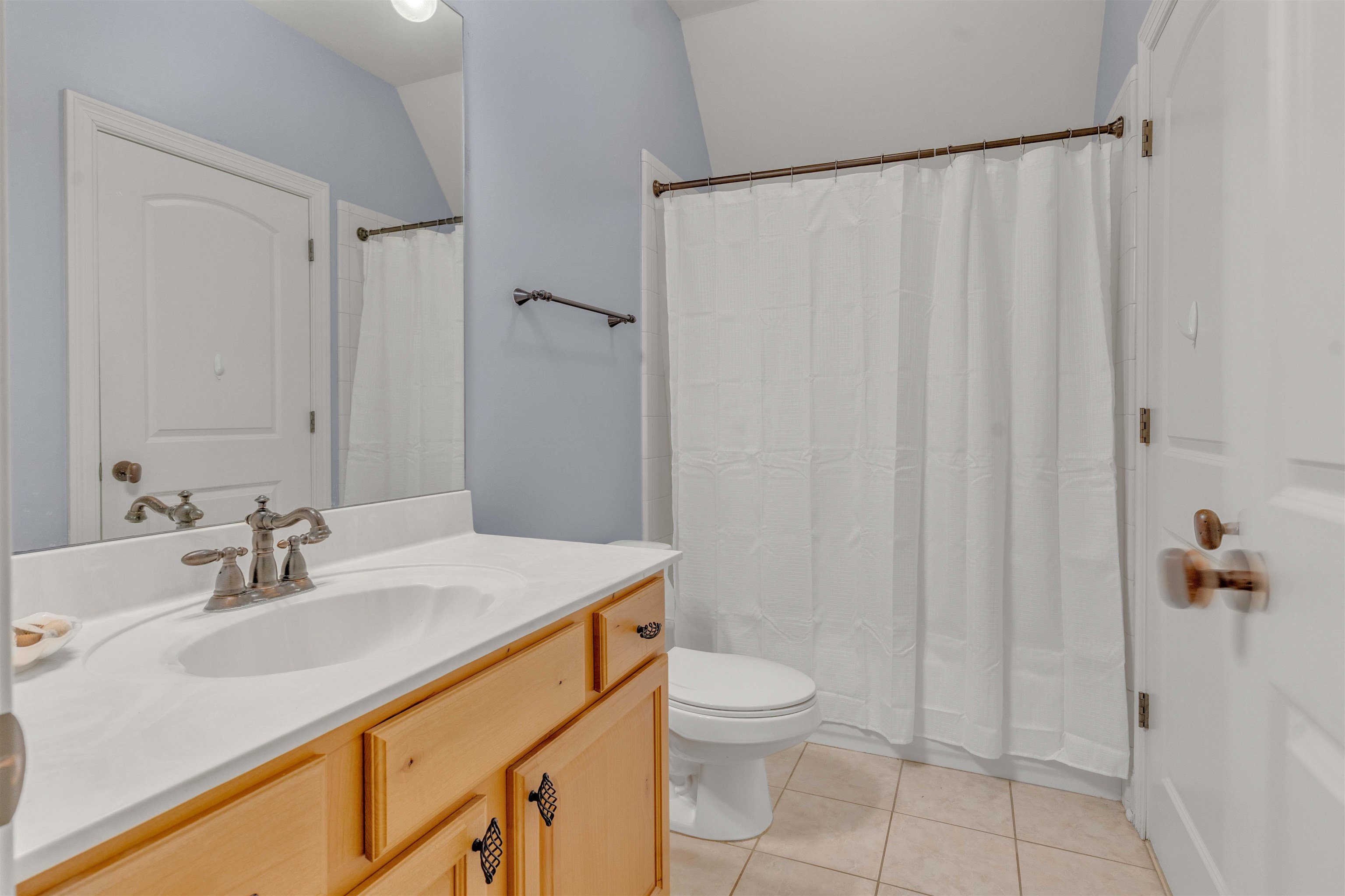1218 Braystone Trail Collierville, TN 38017 - Photo 26 of 40 a bathroom with a sink a toilet and shower