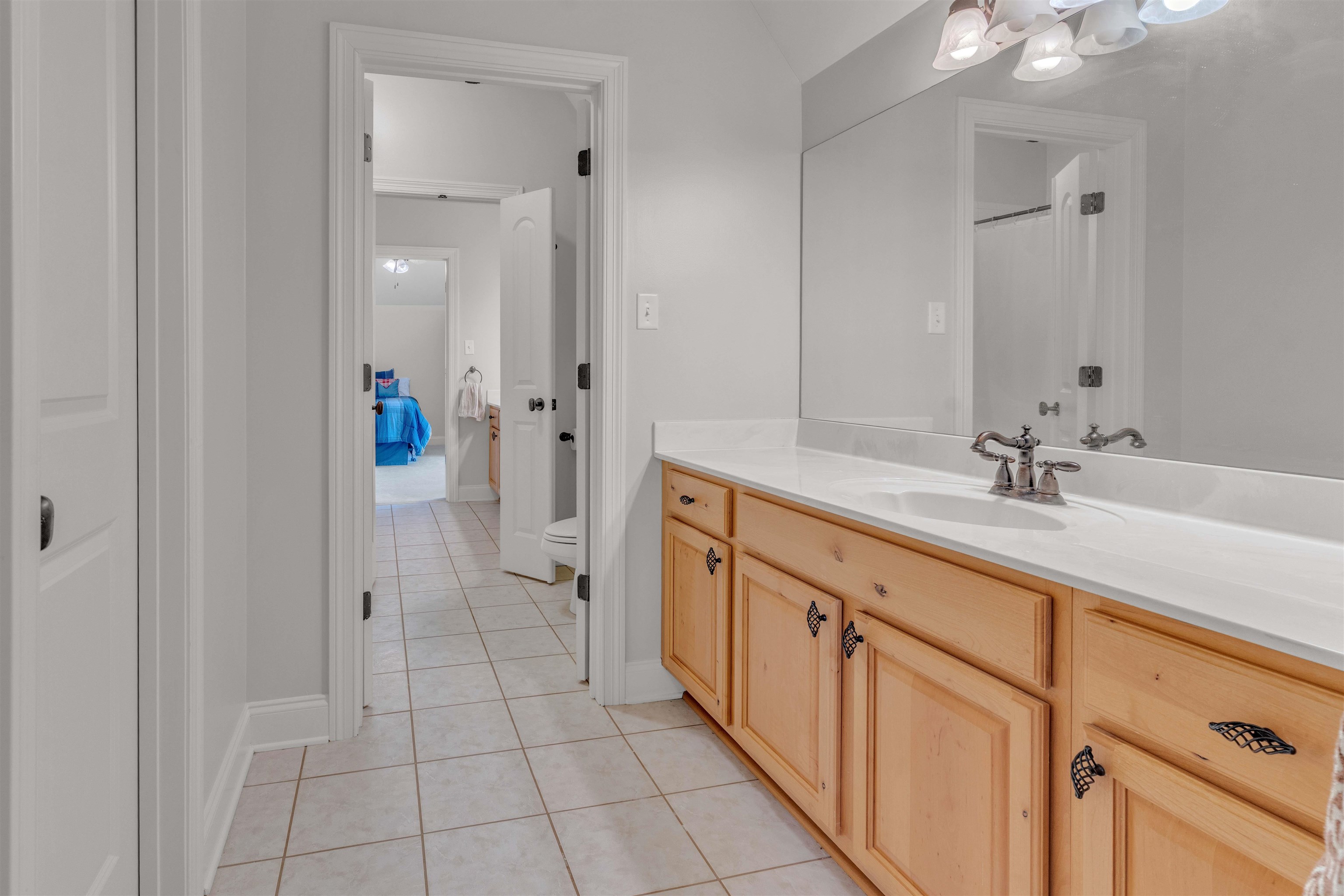 1218 Braystone Trail Collierville, TN 38017 - Photo 27 of 40 a spacious bathroom with a shower sink and mirror