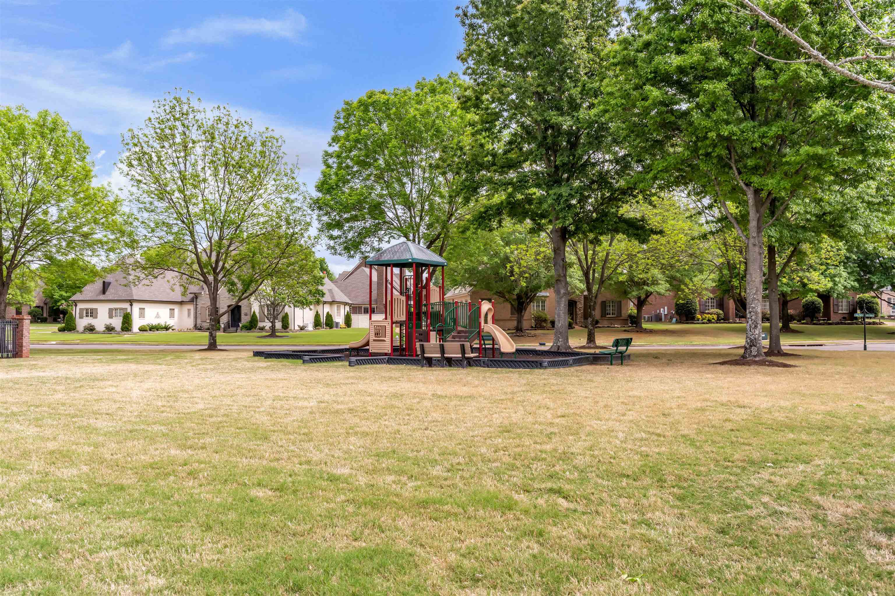 1218 Braystone Trail Collierville, TN 38017 - Photo 39 of 40 Community playground featuring a multi-level structure with slides and a covered platform