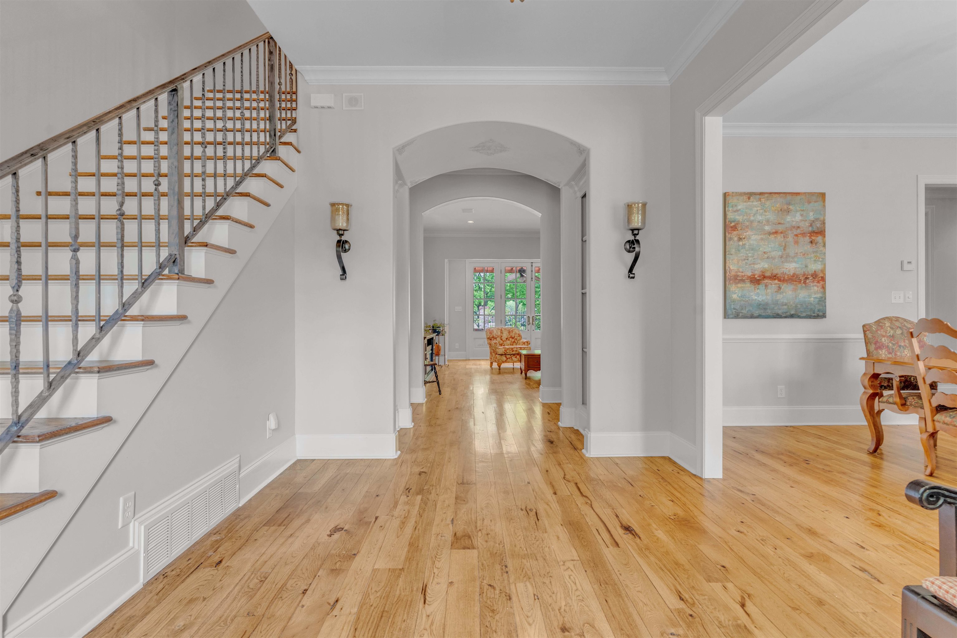 1218 Braystone Trail Collierville, TN 38017 - Photo 5 of 40 a view of a hallway view with wooden floor and staircase