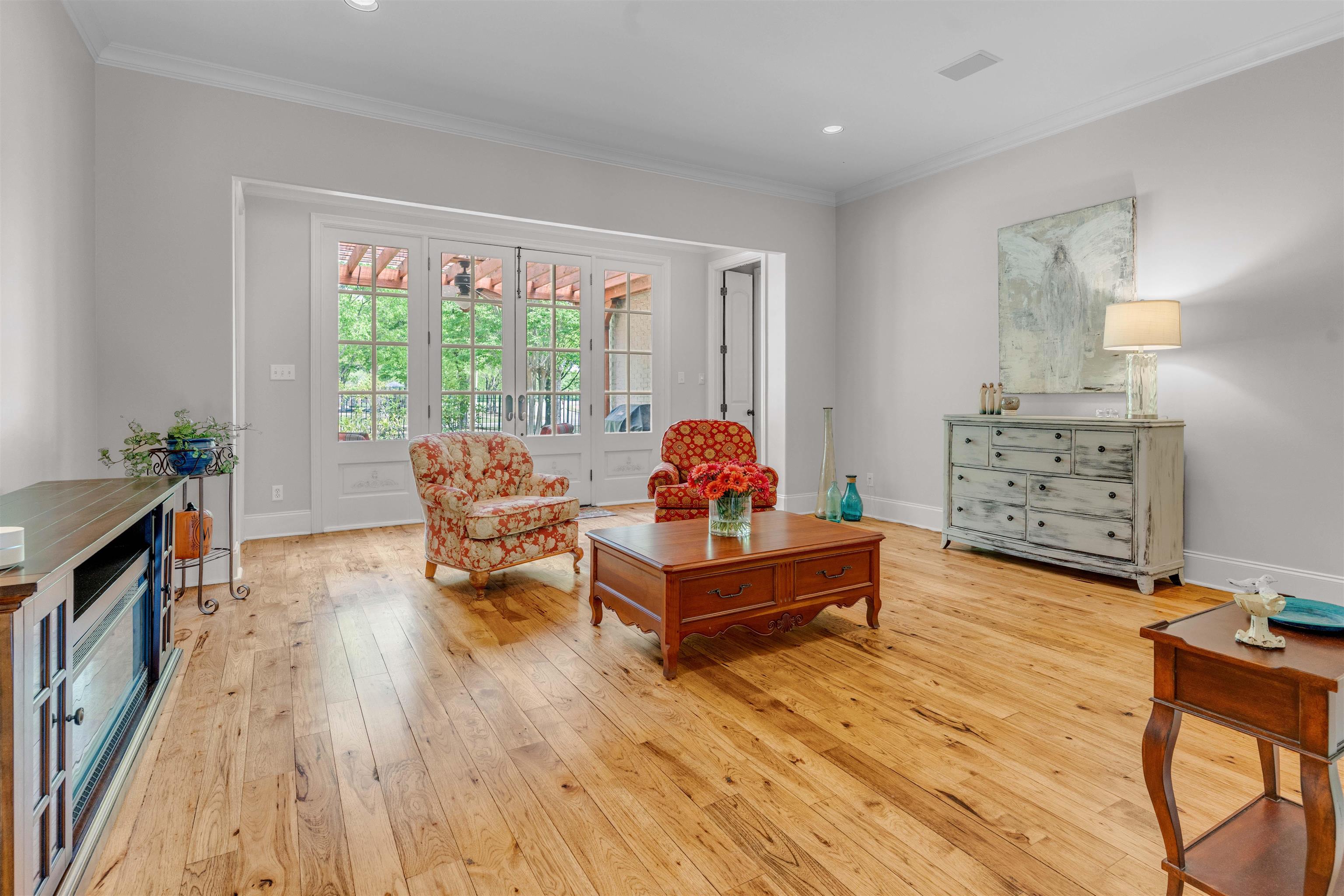 1218 Braystone Trail Collierville, TN 38017 - Photo 8 of 40 Sitting room with crown molding, light wood finished floors, and recessed lighting
