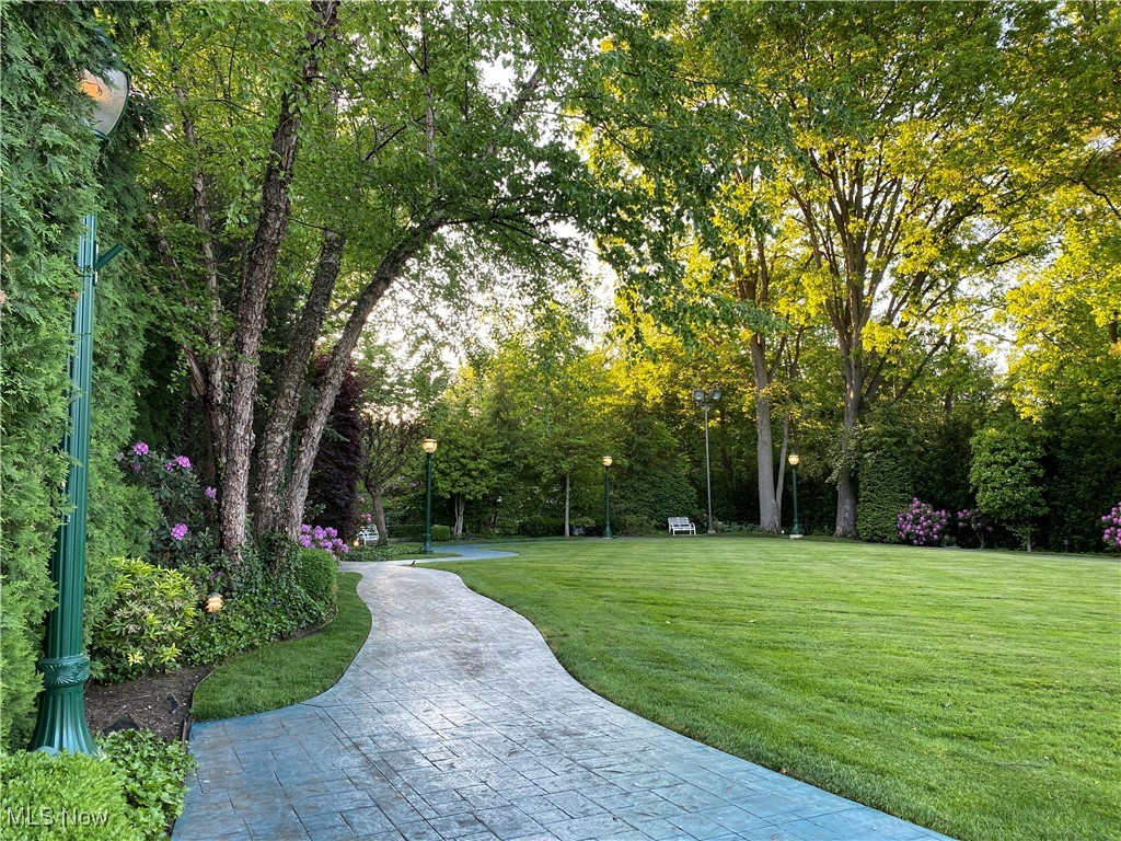 48 South Wheaton Road Akron, OH 44313 - Photo 6 of 48 Owner added this charming blue path that winds along the perimeter of the backyard