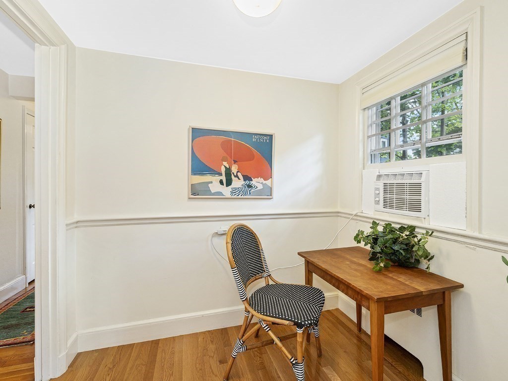 8 Monadnock Road Arlington, MA 02476 - Photo 14 of 36 a workspace with furniture and a window