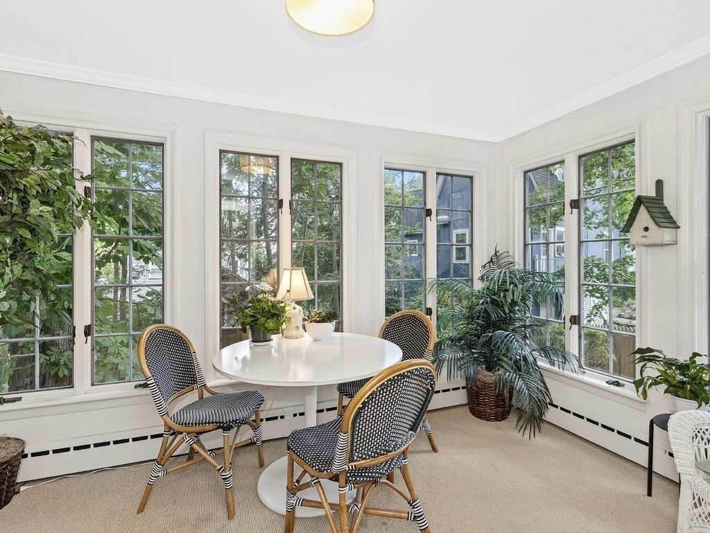 8 Monadnock Road Arlington, MA 02476 - Photo 15 of 36 a view of a dining room with furniture window and outside view